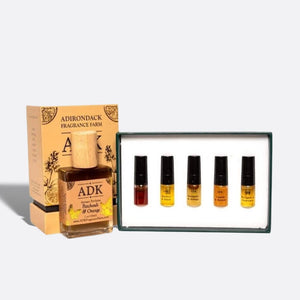 Gold ADK designed Patchouli Orange Perfume Spray Bottle with sample discovery box