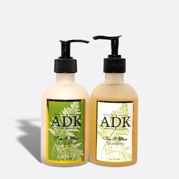 Fern & Moss conditioner and shampoo bottles with ADK Labels